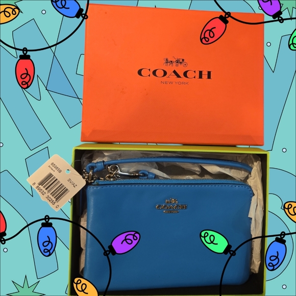 Coach Handbags - Coach wristlet NWT in box